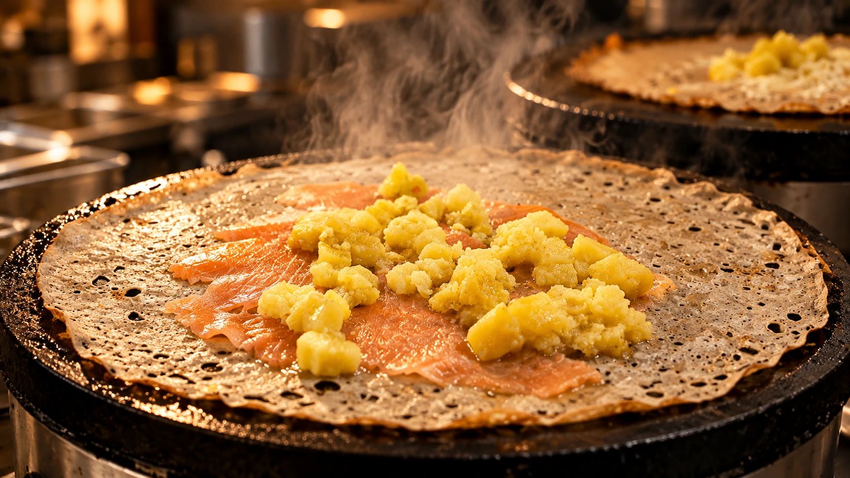 Galette de sarrasin en cuisson sur le billig